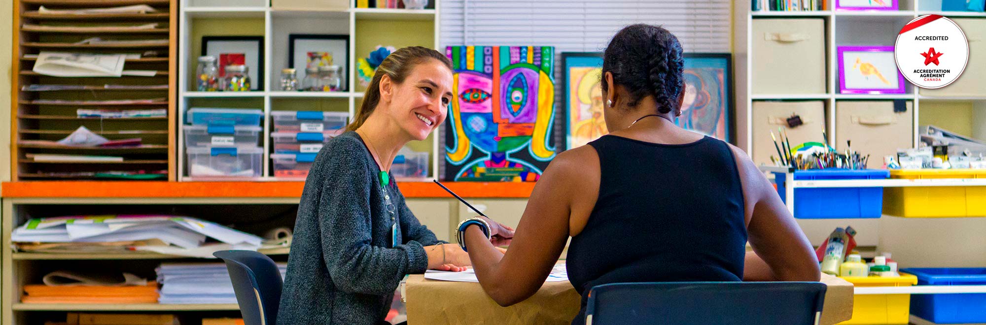 Art therapist and client working together